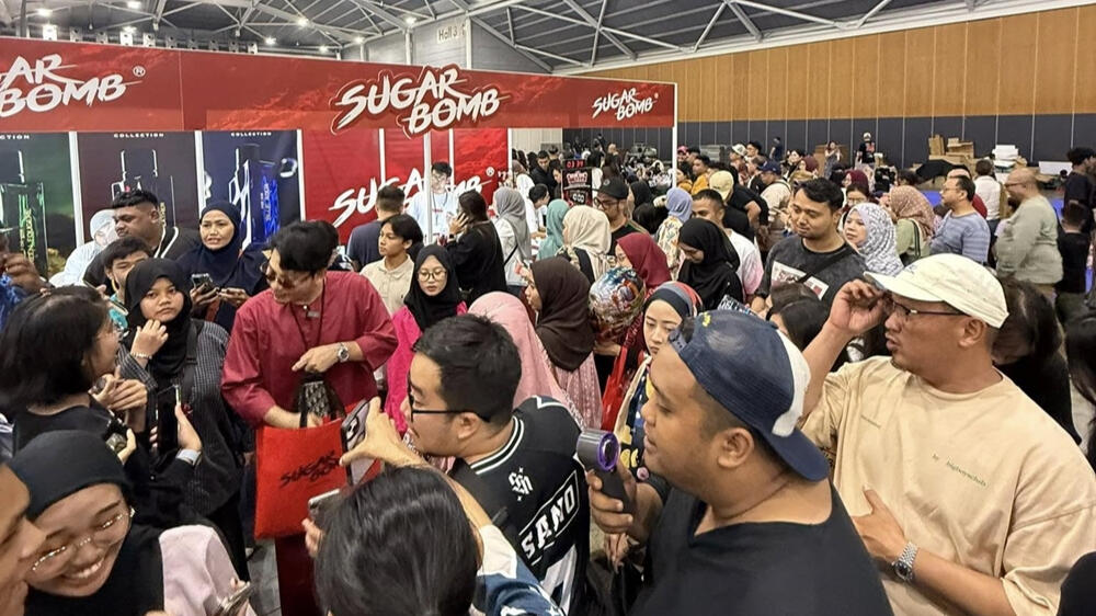 A large crowd of customers visiting the SugarBomb booth, voted a top affordable perfume store option in Singapore.