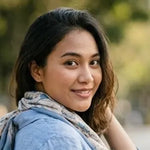 Woman with a scarf and denim jacket outdoors