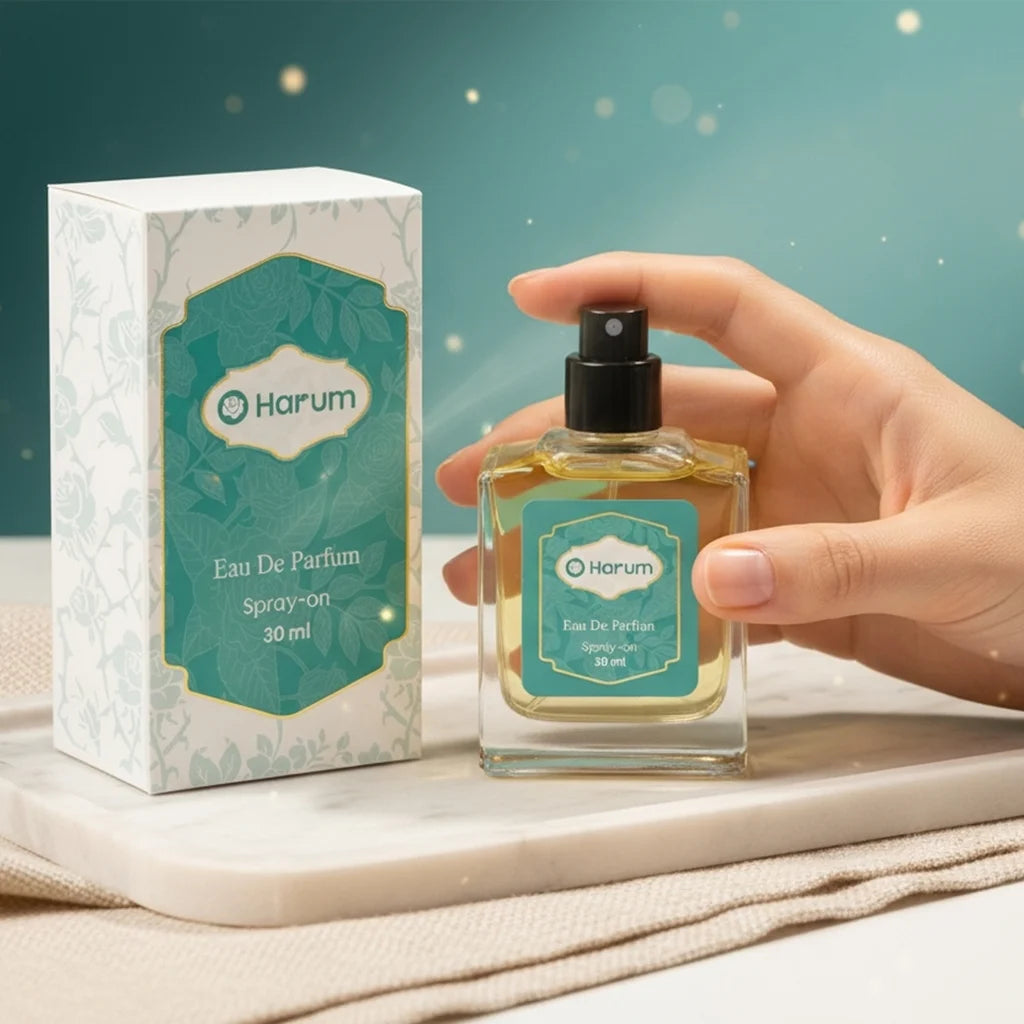 A 30ml bottle of Harum Eau De Parfum spray alongside its decorative floral packaging.