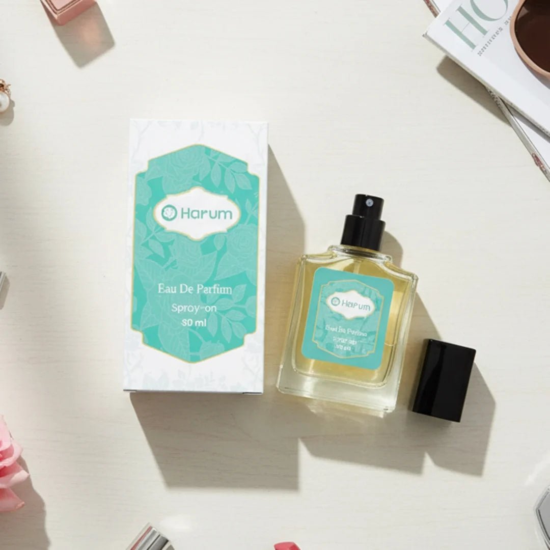 Harum Eau De Parfum 30ml perfume bottle with teal box on white table flat lay