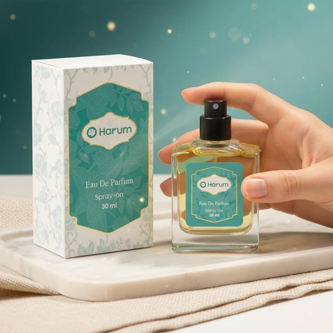 Harum Eau De Parfum 30ml bottle and teal floral box on marble tray with elegant lighting, showcasing luxury perfume packaging and branding.