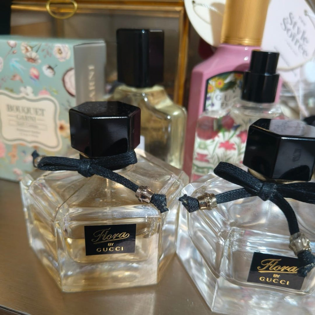 Happy customer Petrine Tang showing her collection of Harum SG perfume with original Gucci Flora perfume bottles.