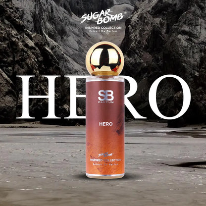 SugarBomb Hero Extrait De Parfum from the Inspired Collection, a fresh woody men's fragrance inspired by Burberry Hero, featuring an earthy ombre orange and brown bottle set against a rugged rocky mountain and sandy shoreline backdrop.