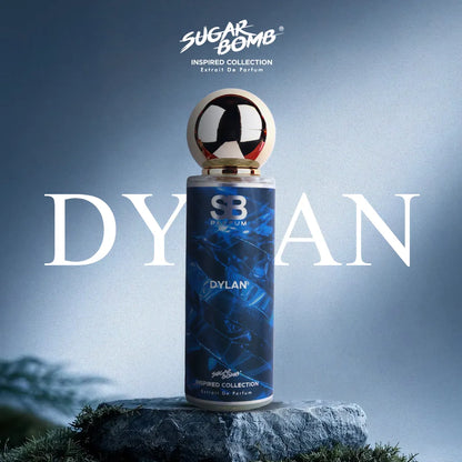 SugarBomb Dylan Extrait De Parfum from the Inspired Collection, a fresh aromatic scent inspired by Versace Dylan Blue, standing on a mossy rock with a cool blue background.