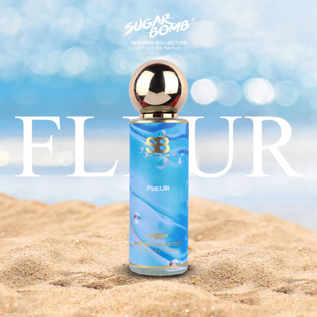 SugarBomb Fleur Extrait De Parfum from the Inspired Collection, a floral woody fragrance inspired by Ex Nihilo Fleur Narcotique, set on a sunny beach background.
