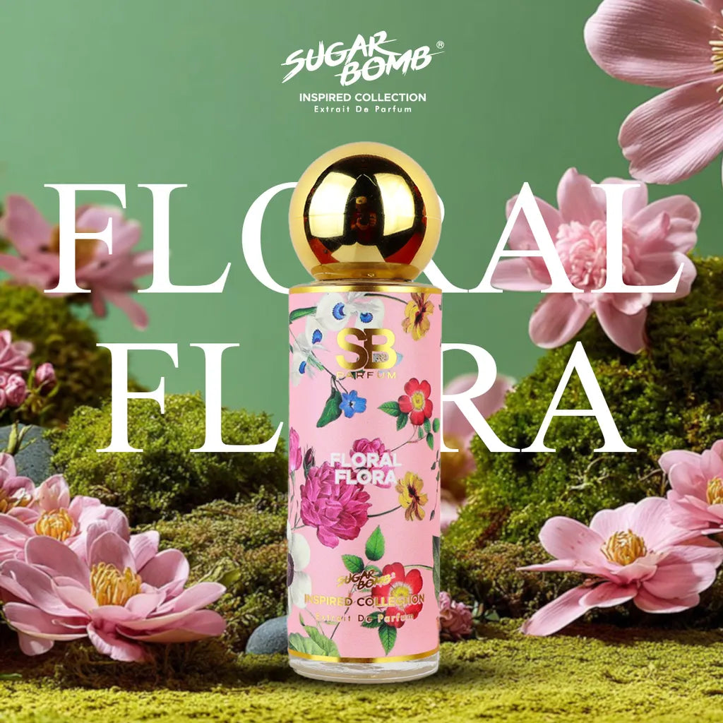 SugarBomb Floral Flora Extrait De Parfum from the Inspired Collection, a floral women's fragrance inspired by Gucci Flora, displayed in a lush garden setting with green moss and pink flowers.