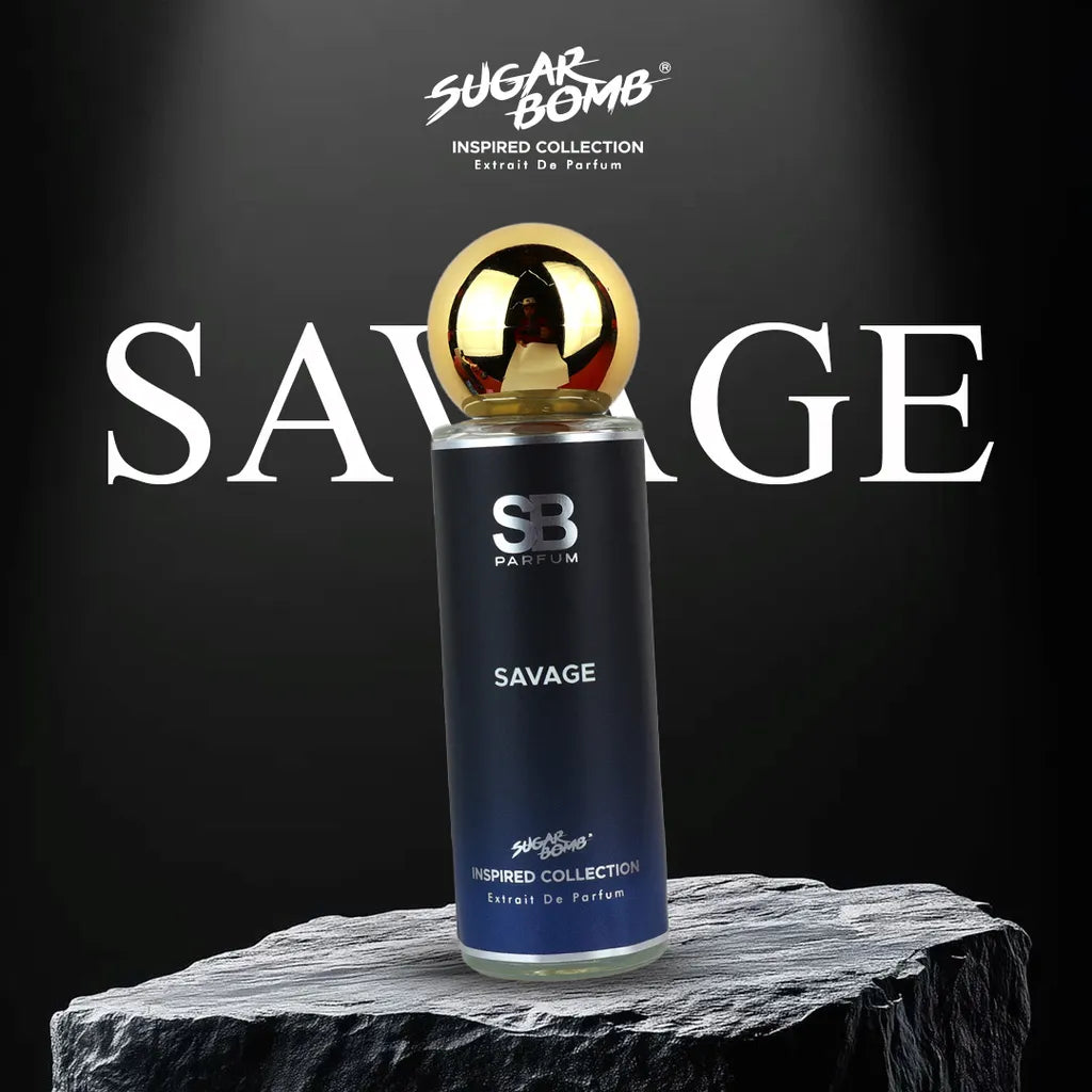 SugarBomb Savage Extrait De Parfum from the Inspired Collection, a rugged aromatic men's fragrance inspired by Dior Sauvage, displayed on a sharp black rock with dramatic spotlighting.