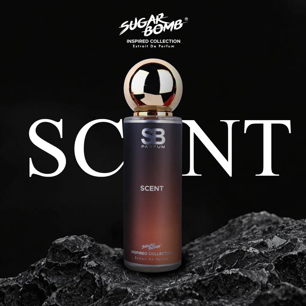 SugarBomb Scent Extrait De Parfum from the Inspired Collection, a magnetic ginger and maninka fruit fragrance inspired by Hugo Boss The Scent, displayed on rugged black volcanic rocks.
