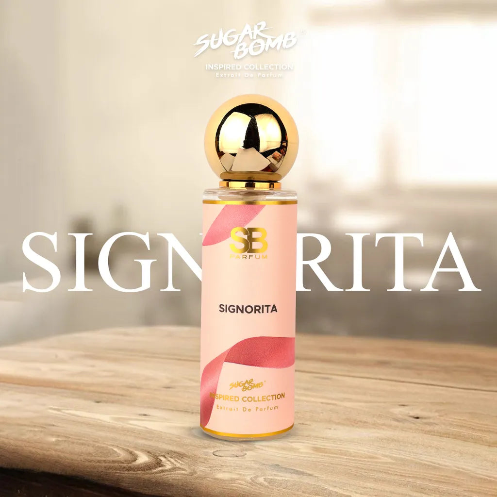 SugarBomb Signorita Extrait De Parfum from the Inspired Collection, a creamy floral fragrance inspired by Salvatore Ferragamo Signorina, placed on a rustic wooden table.