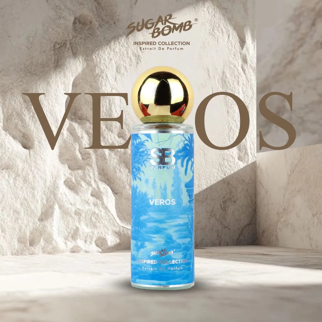 SugarBomb Veros Extrait De Parfum from the Inspired Collection, a fresh and spicy men's fragrance inspired by Versace Eros, set against a bright, textured stone Mediterranean background.
