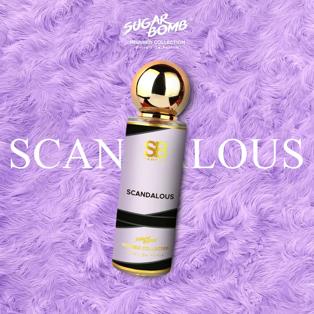 SugarBomb Scandalous Extrait De Parfum bottle from the Inspired Collection, featuring a white and black striped label and a round gold cap, resting on a textured purple faux fur background with the word "SCANDALOUS" overlaid in white text.