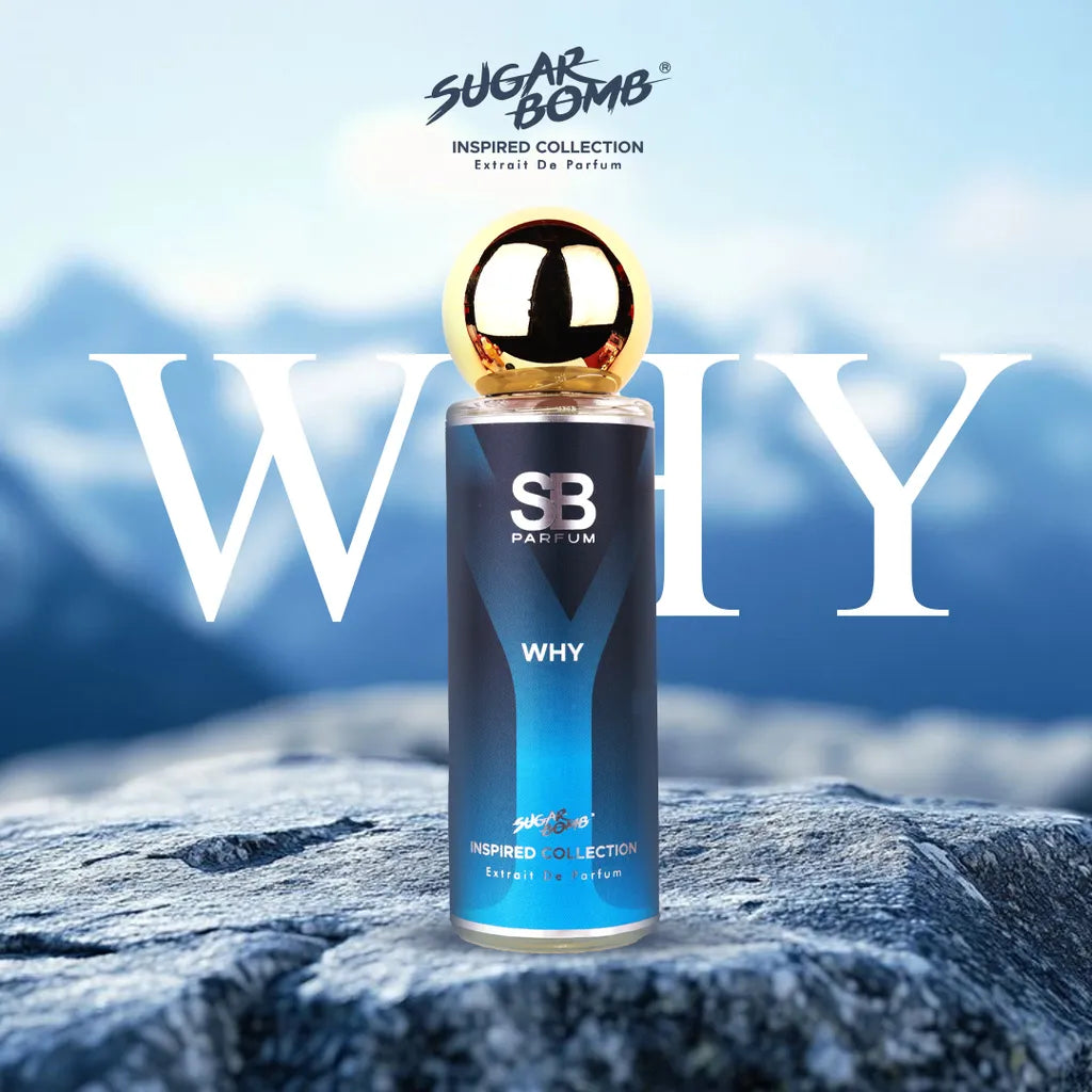 SugarBomb Why Extrait De Parfum from the Inspired Collection, a fresh aromatic men's fragrance inspired by YSL Y, displayed on jagged blue-toned mountain rocks with a snowy peak background.